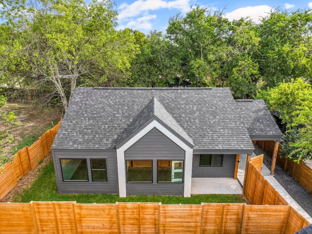 a house view with a garden space