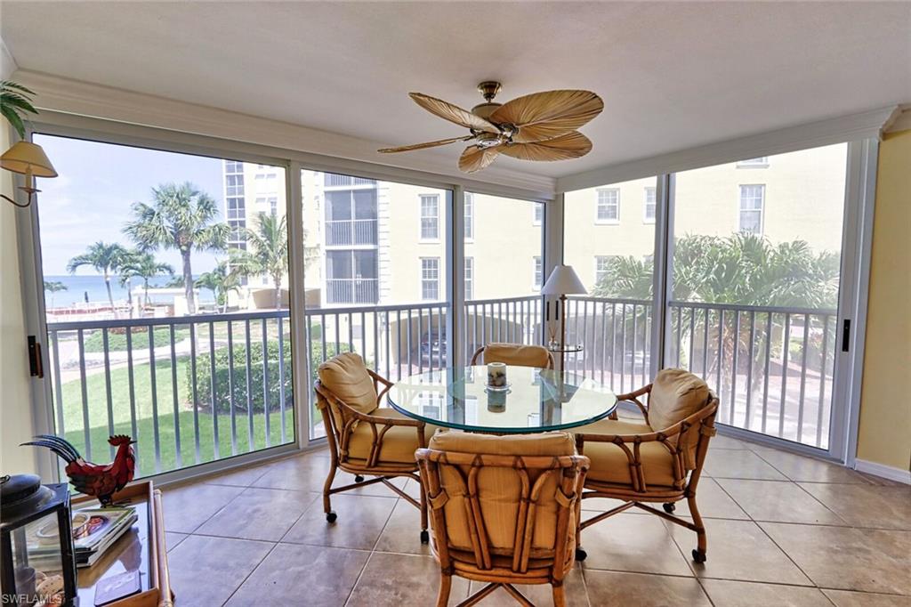 Sunroom / solarium featuring ceiling fan and plenty of natural light