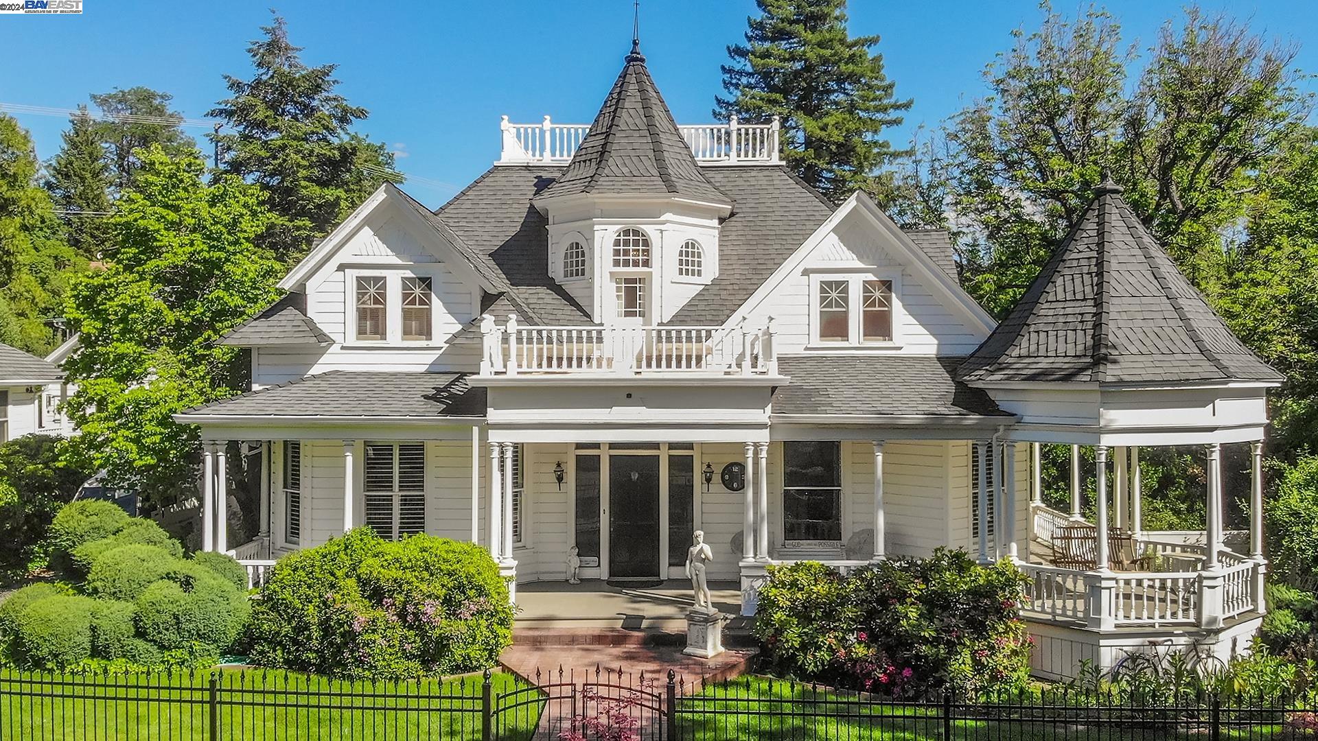 front view of a house with a garden