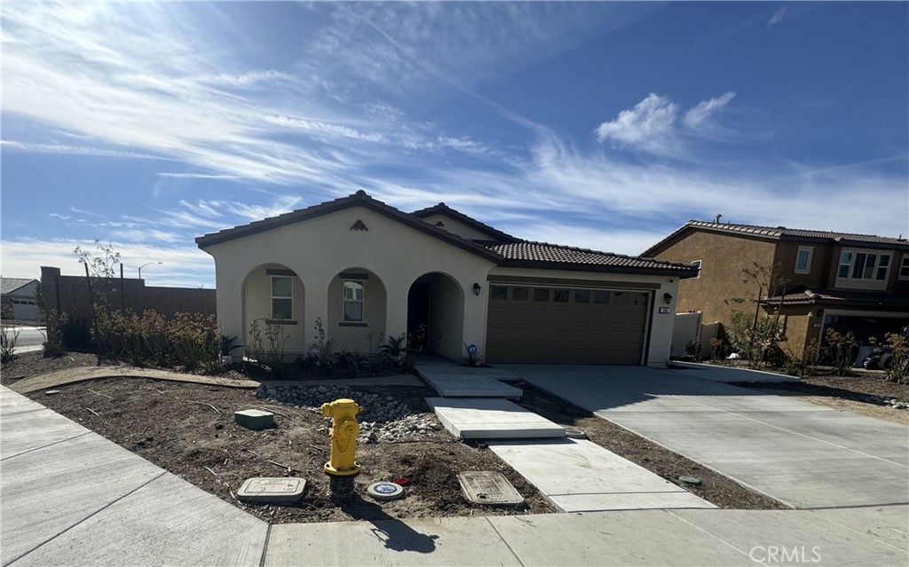 a front view of a house with patio