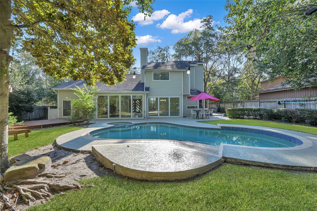 Enjoy a private backyard oasis at 4 Thornhedge Ct.