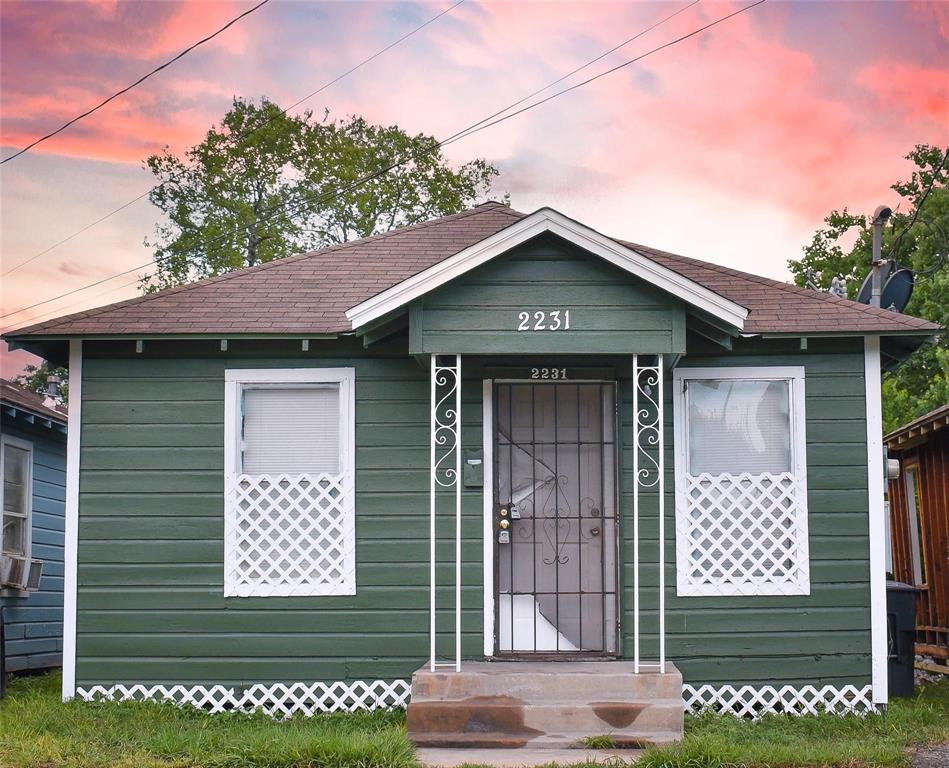 a front view of a house with a garage