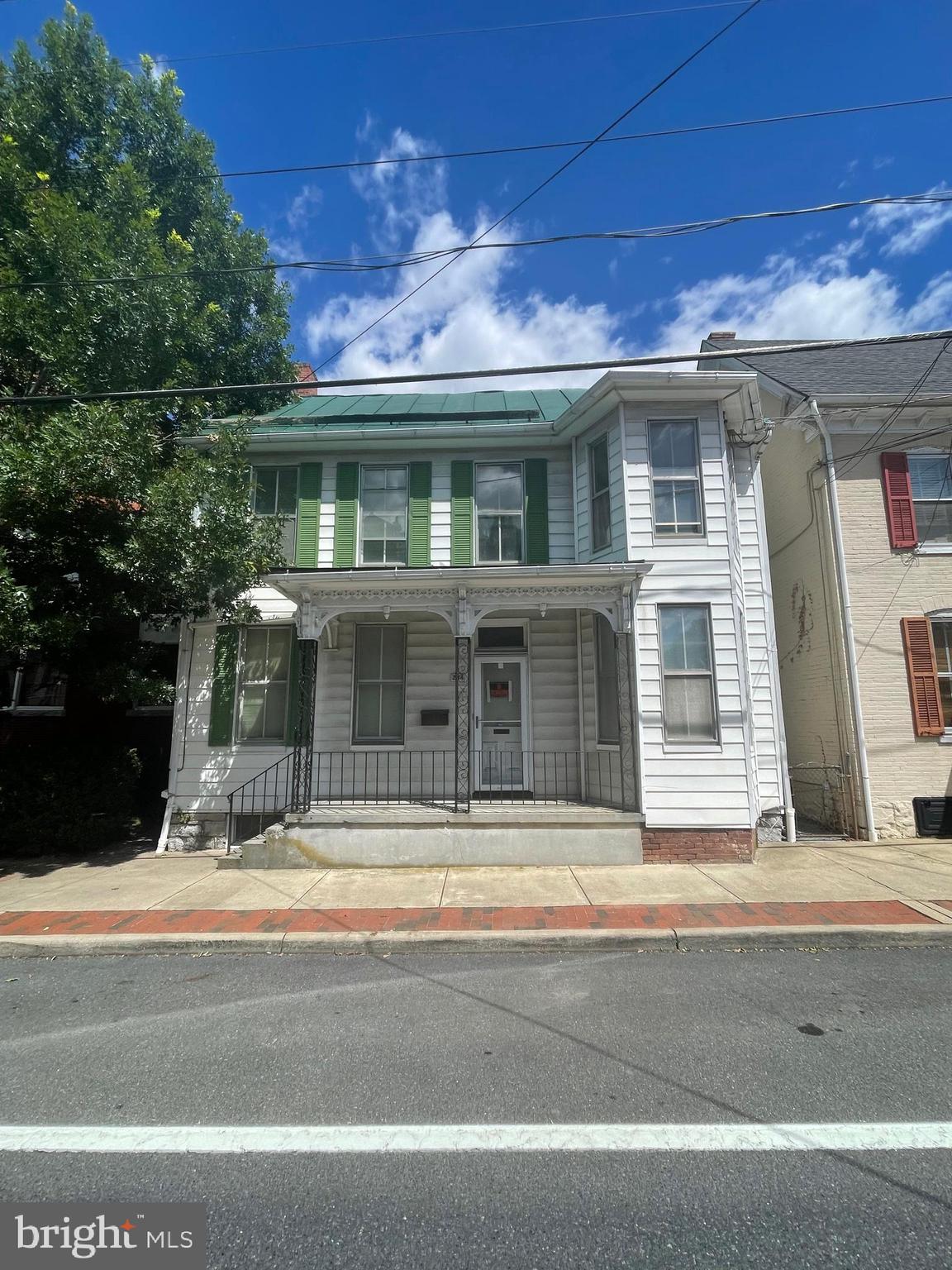 a front view of house with yard