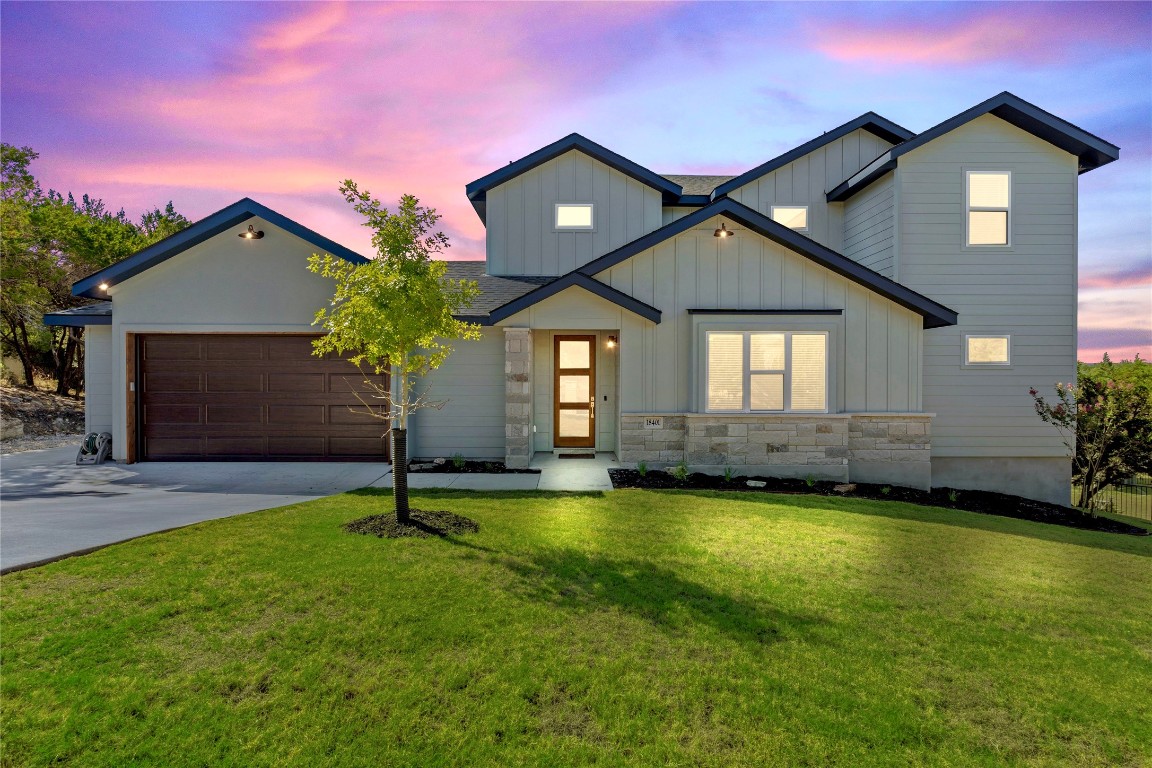 a house that has a big yard with wooden fence