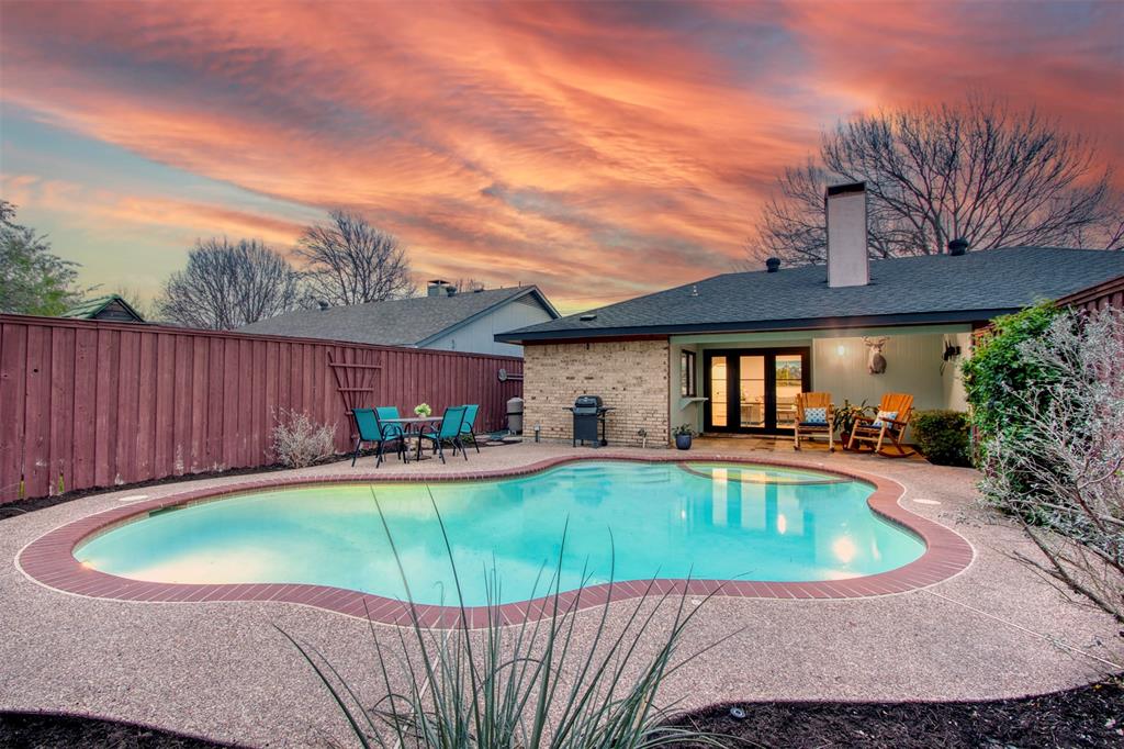 a view of a house with a swimming pool