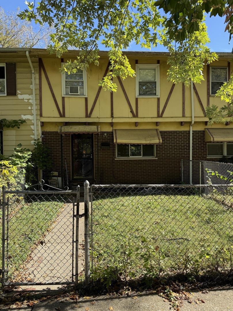 a house with trees in front of it