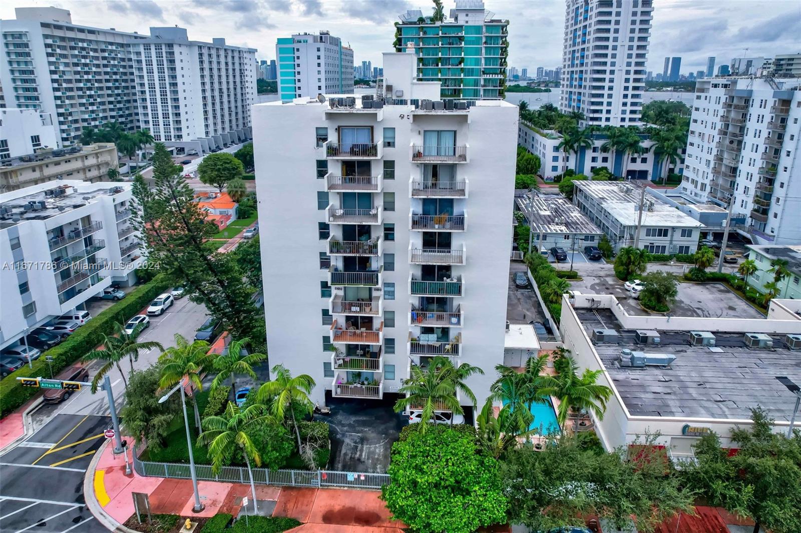 a view of building with garden and plants