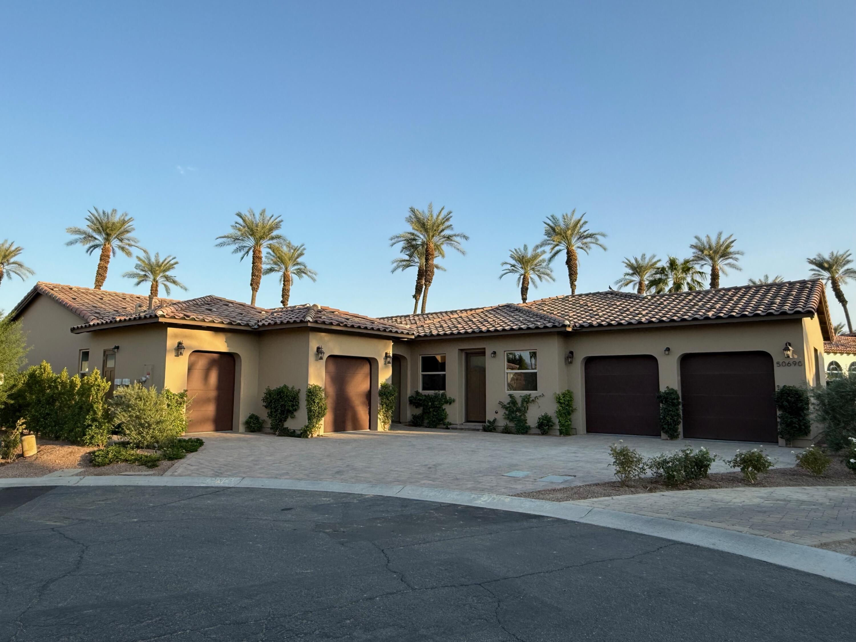 front view of a house with a street