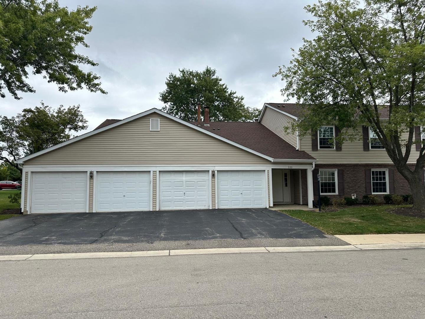 a view of a yard in front of a house