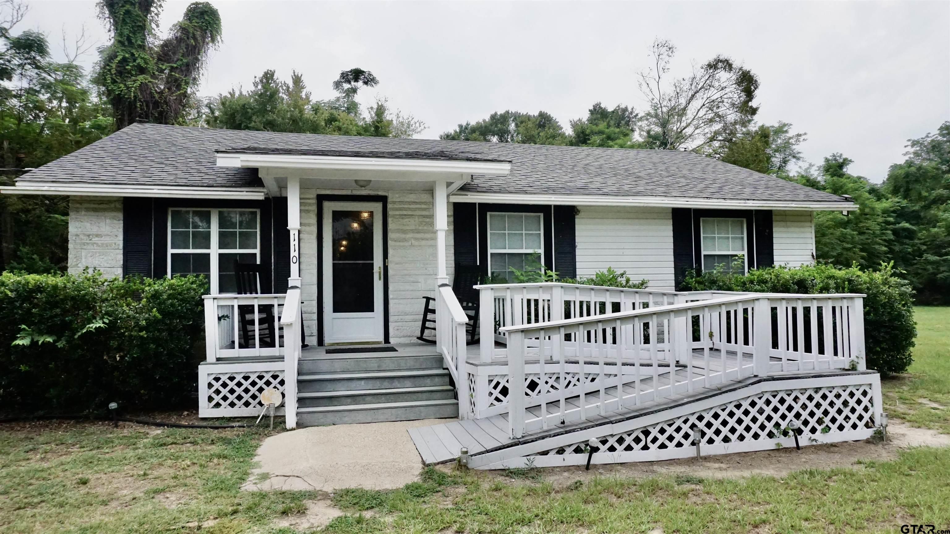 a view of a house with a deck