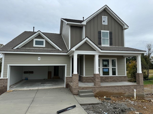 a front view of a house with garage