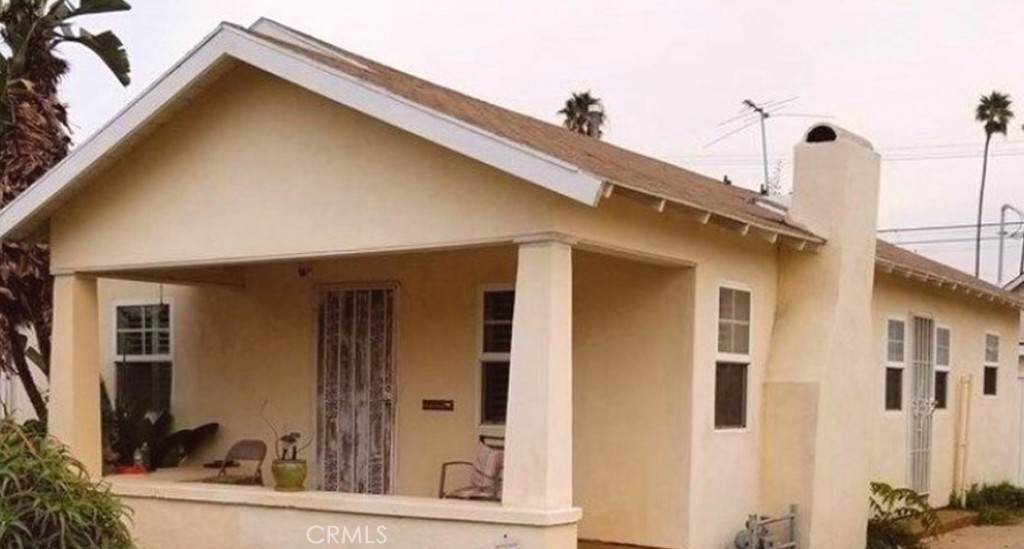 a front view of a house with a glass door