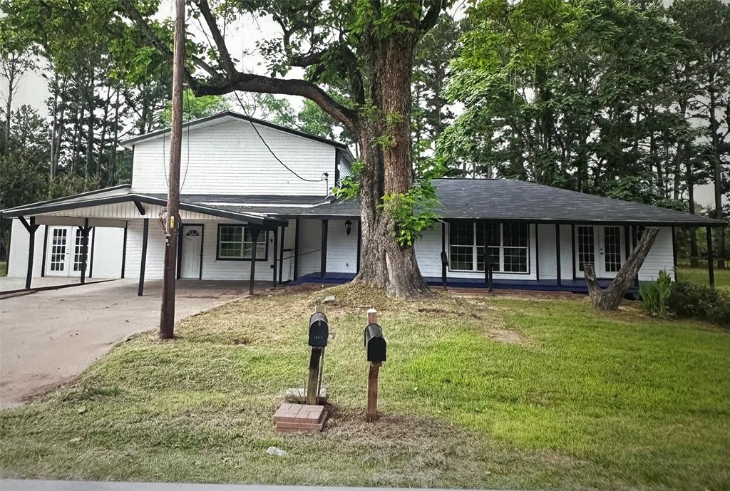 a house view with a garden space