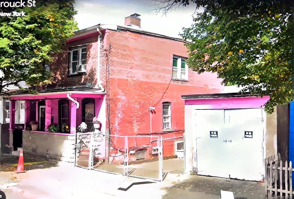 View of side of home and garage