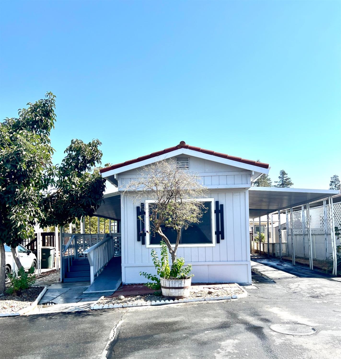 a front view of a house with garden