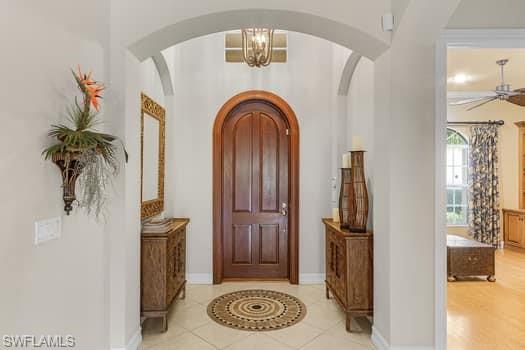 a view of entryway with a front door and wooden floor