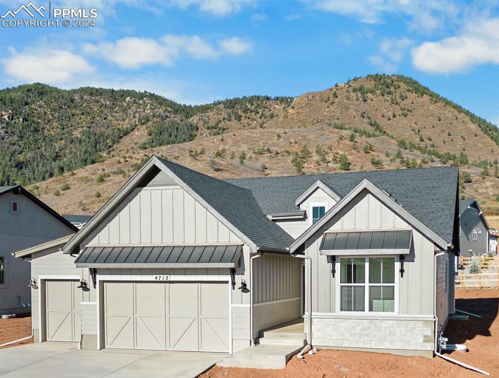 a view of a house with a mountain