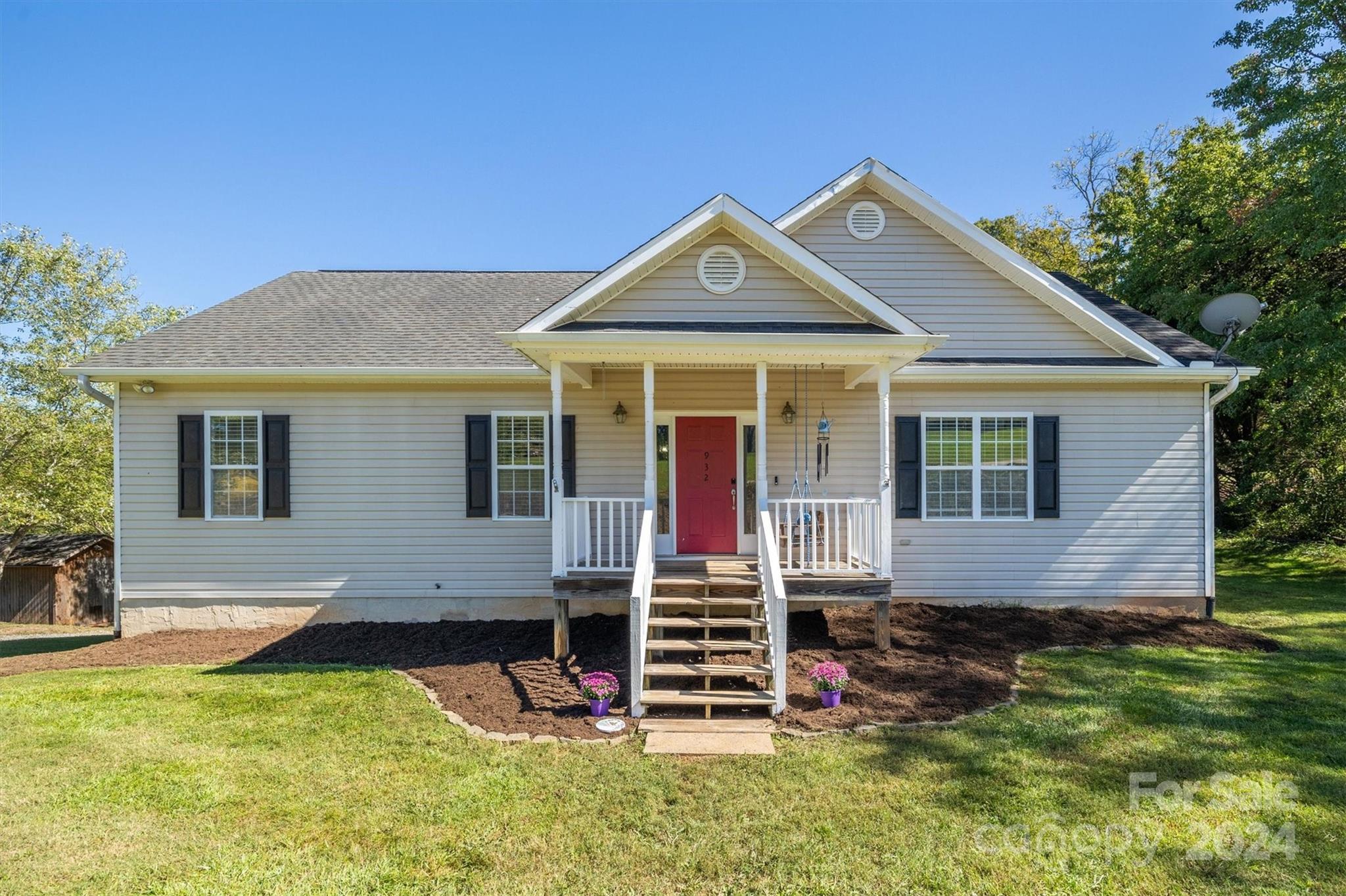 front view of a house with a yard