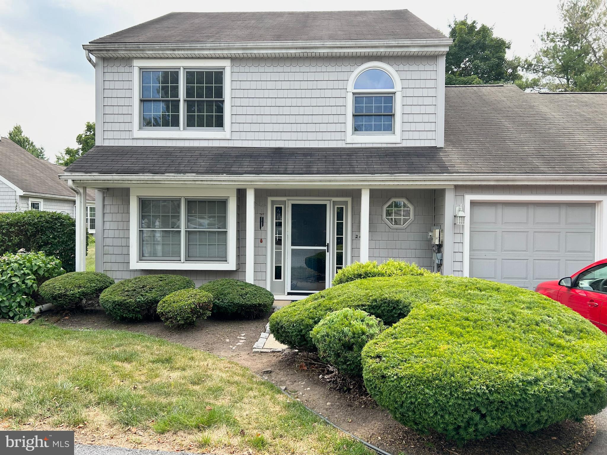 a view of a house with a garden