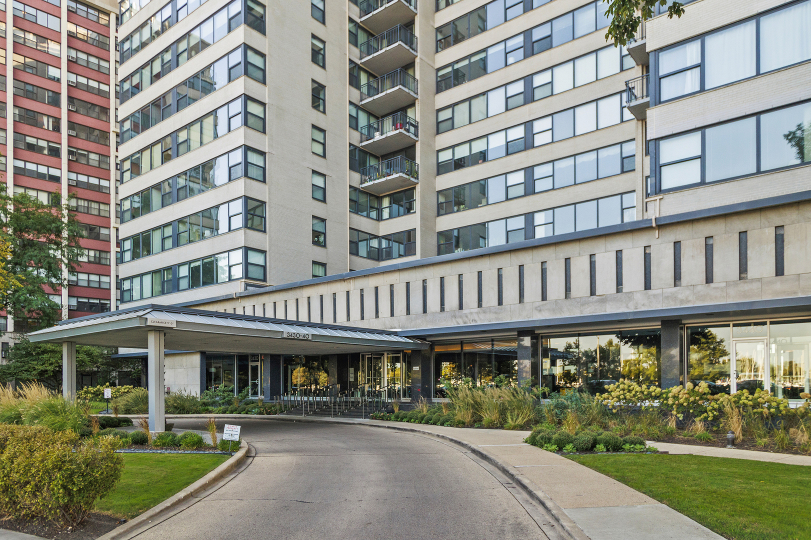 a view of a building with a garden