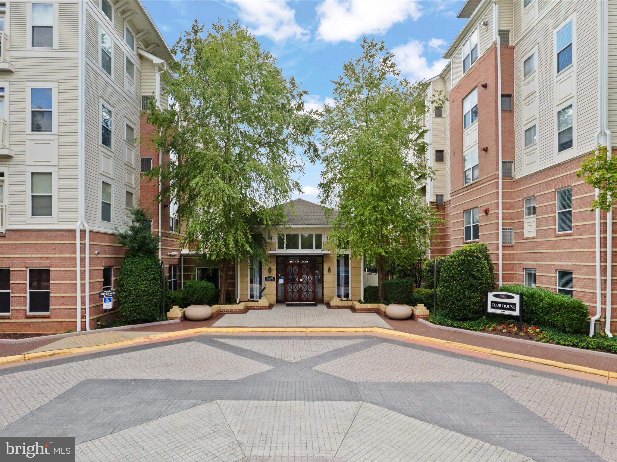 a view of a building with a yard