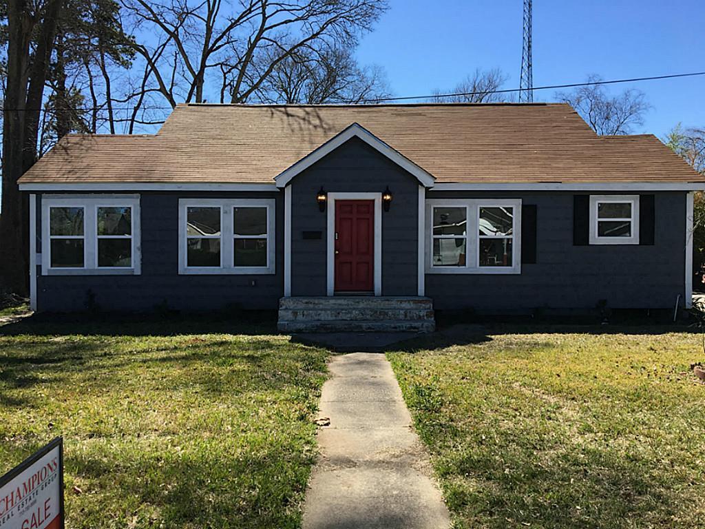 a house with yard in front of it