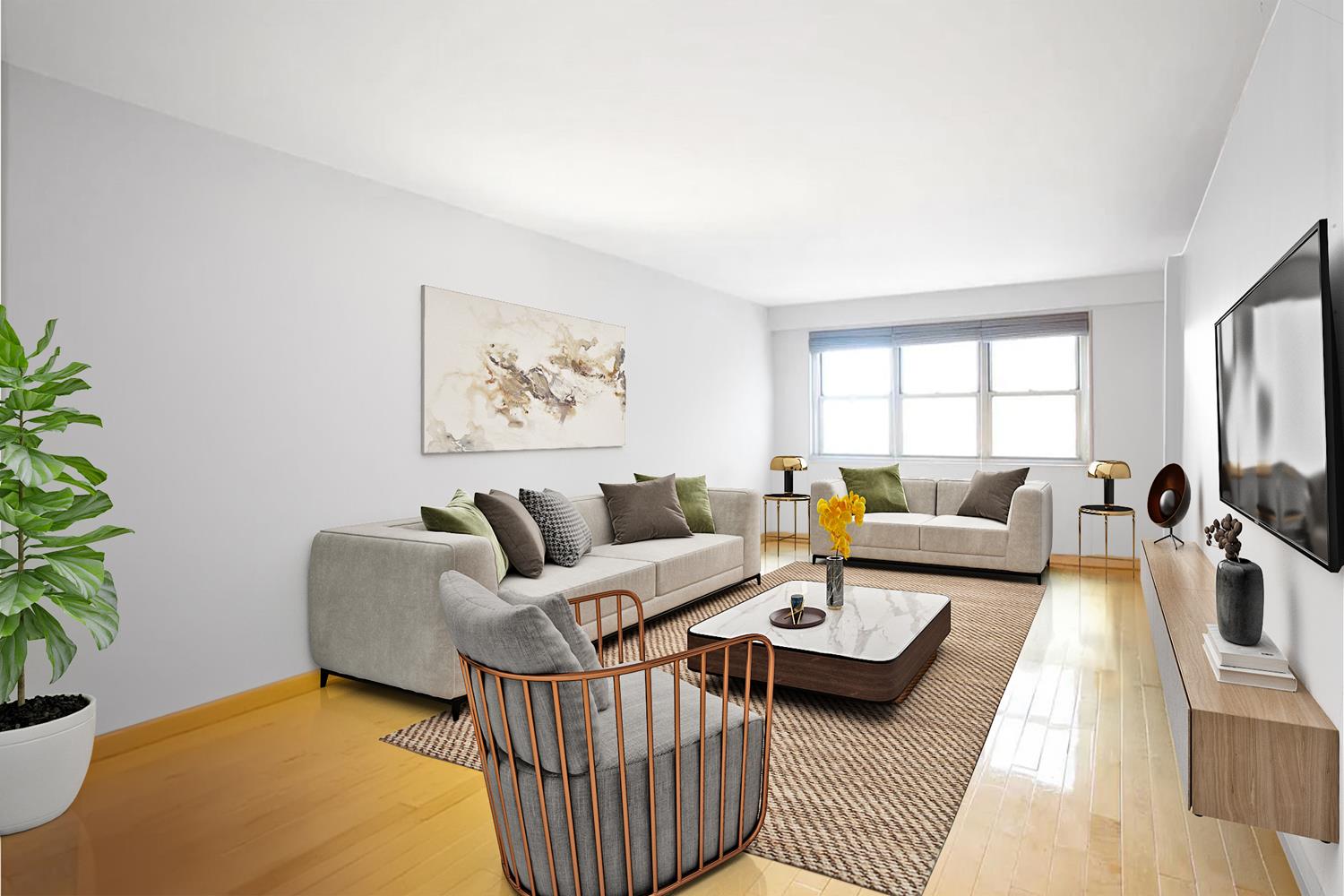 a living room with furniture or couch and a potted plant