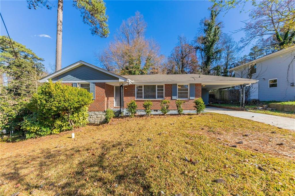 front view of a house with a yard