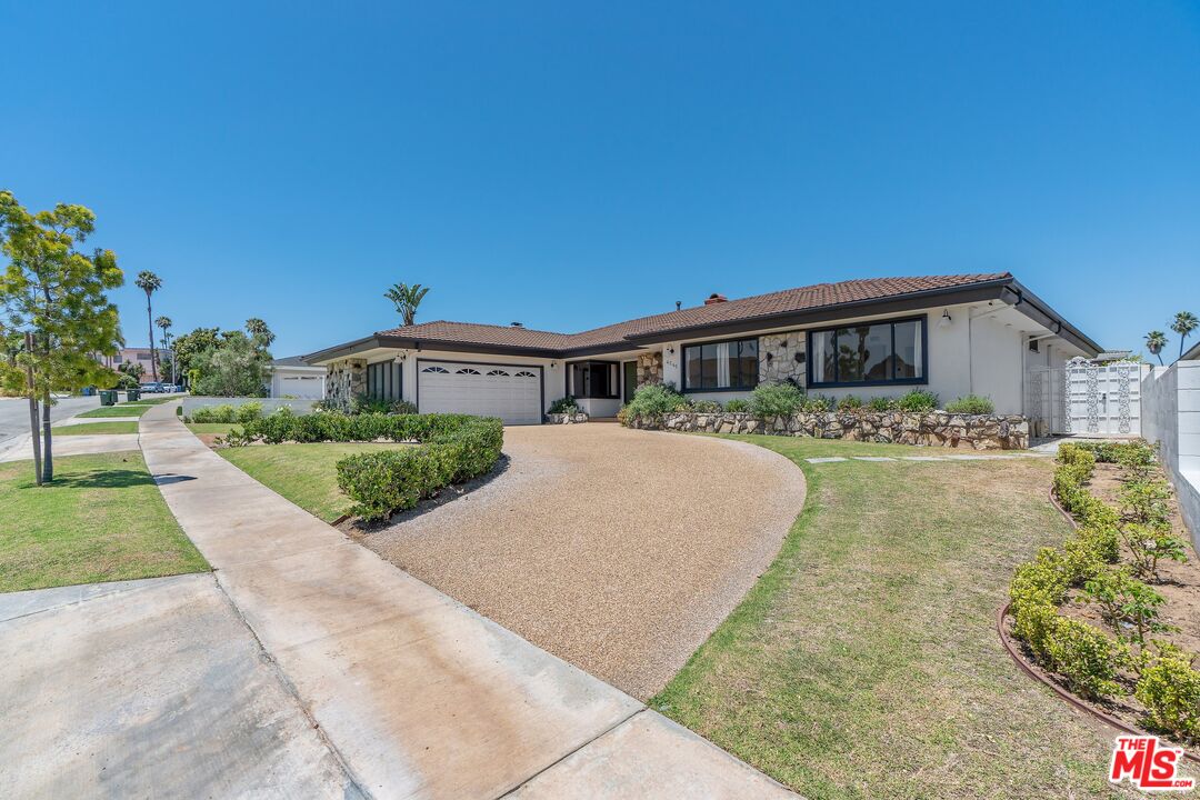 a view of house with outdoor space