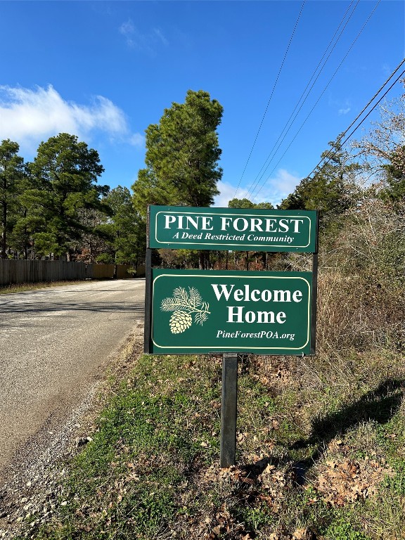 a sign on the side of a road