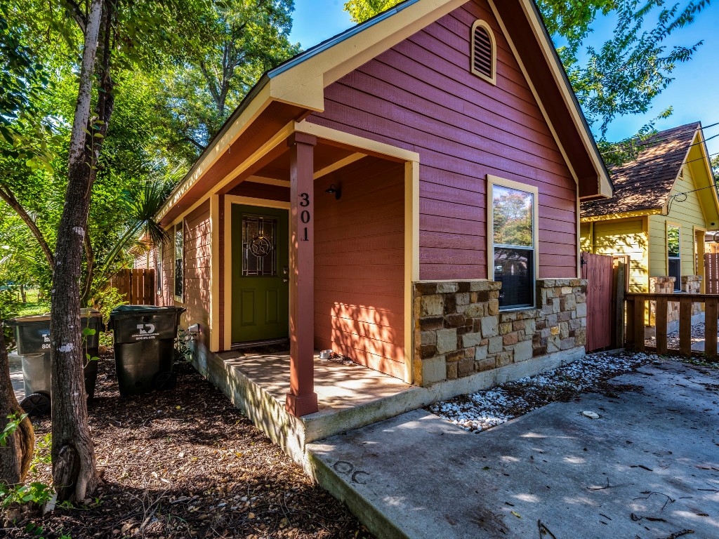 a front view of a house with yard