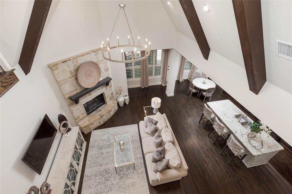 a view of living room with furniture and a flat screen tv