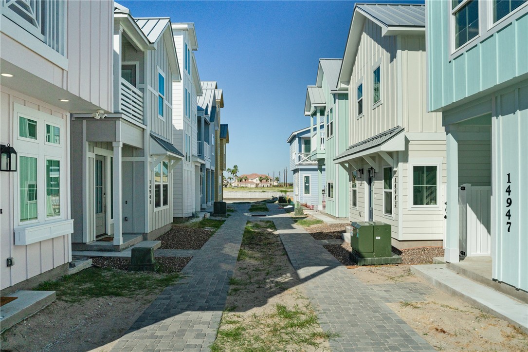 a view of a building with a yard