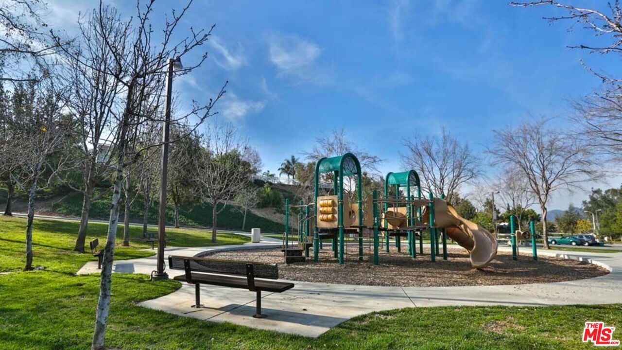 a garden view with a seating space