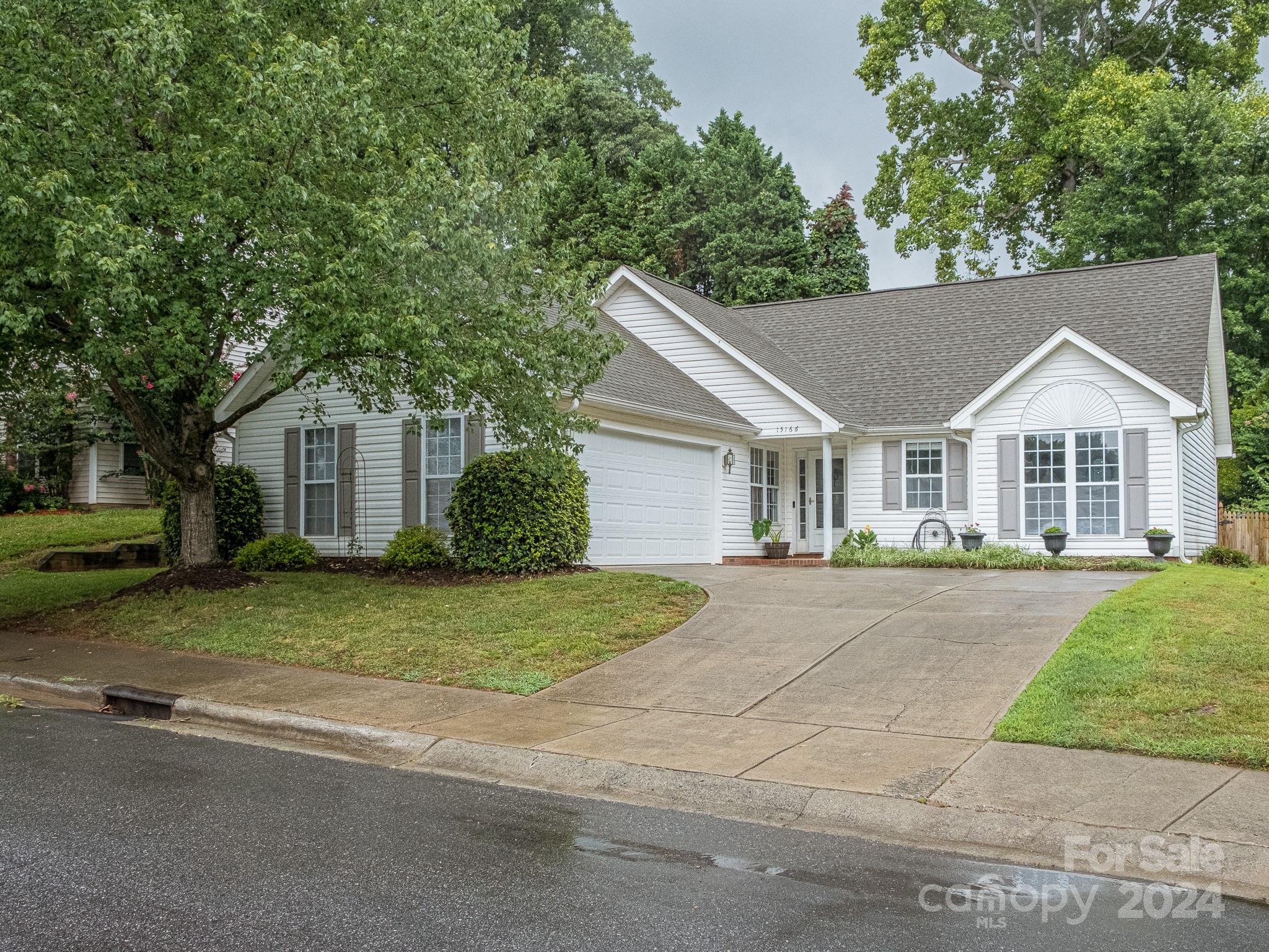 front view of a house and a yard