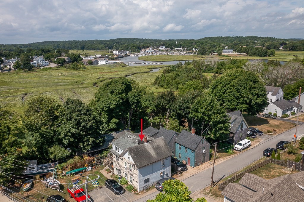 an aerial view of a houses with outdoor space