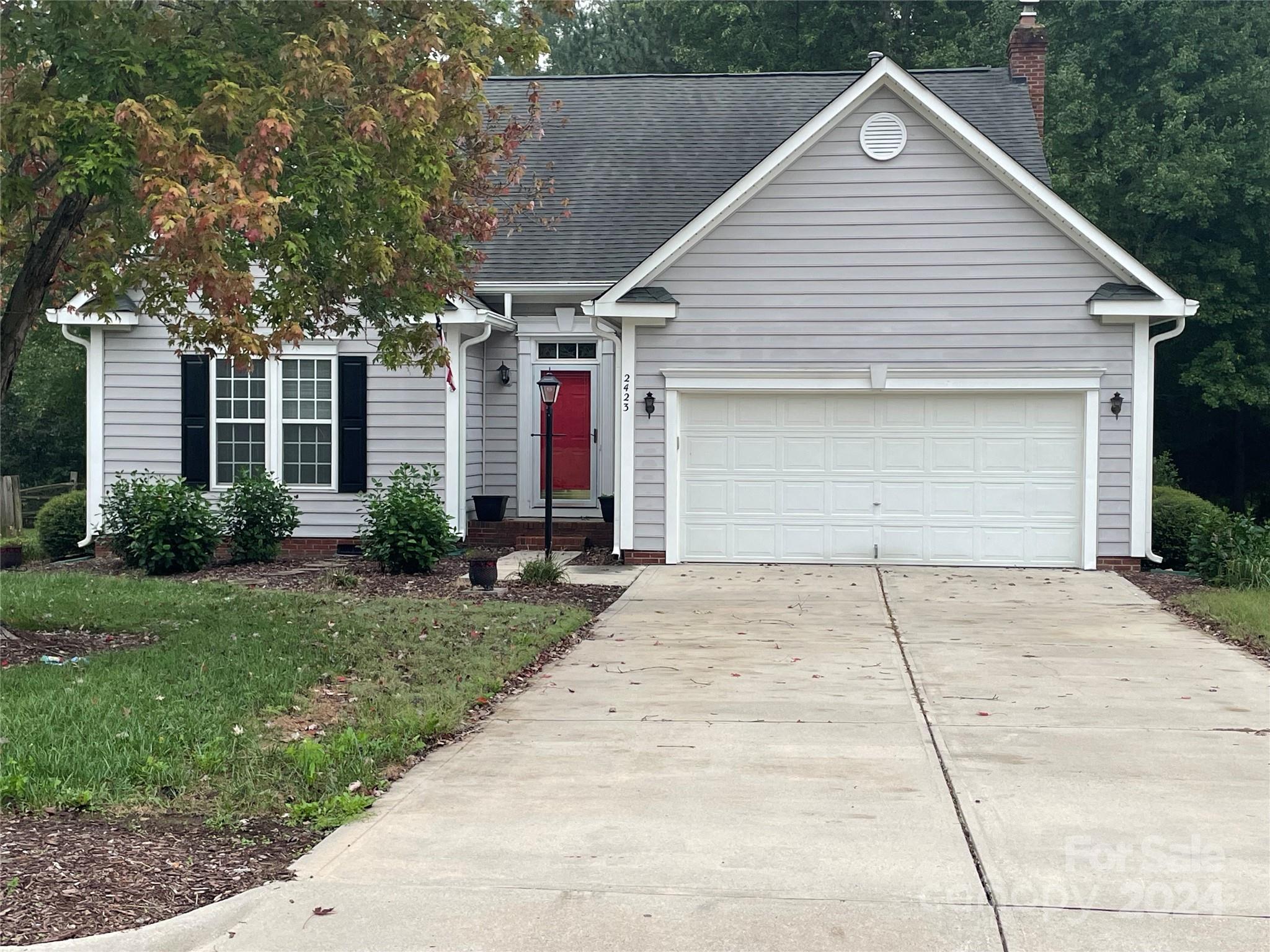 a front view of house with yard