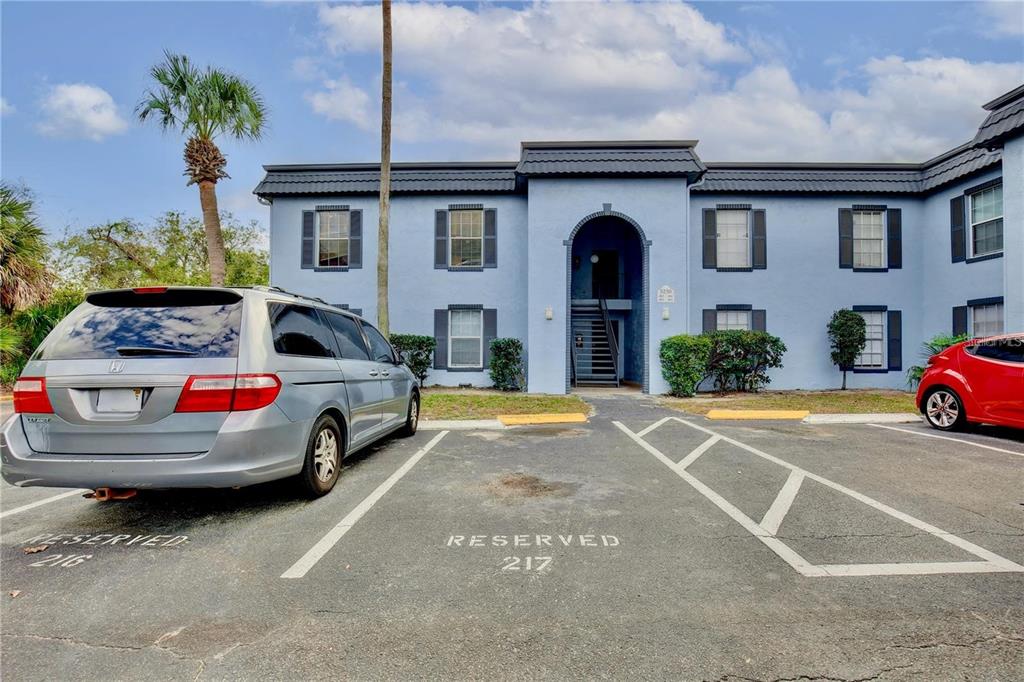 a view of a car park in front of house