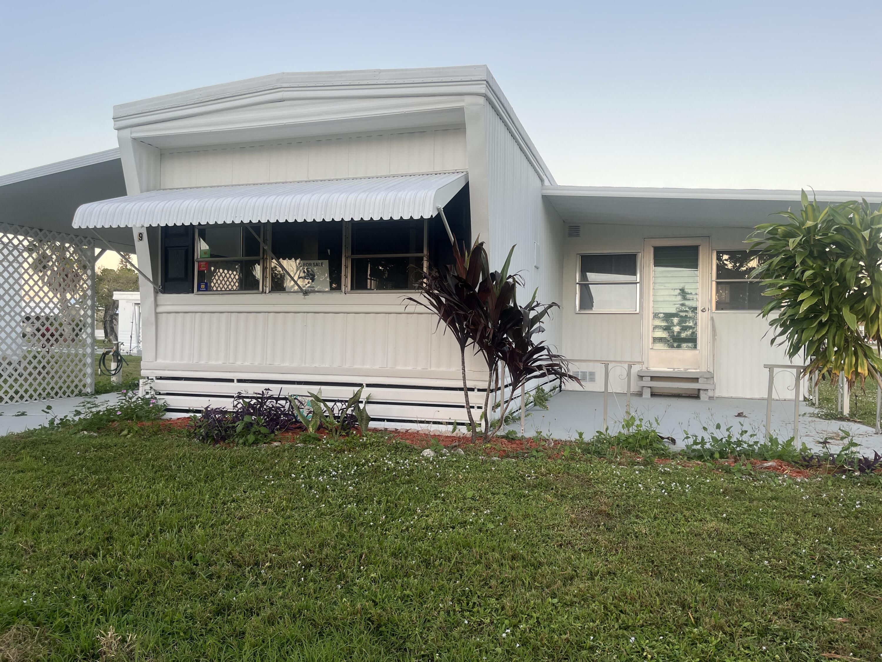 front view of house with a yard