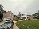 a view of multiple houses with yard