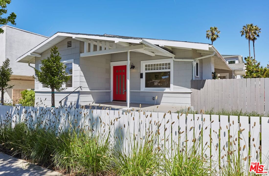 a front view of a house with a garage