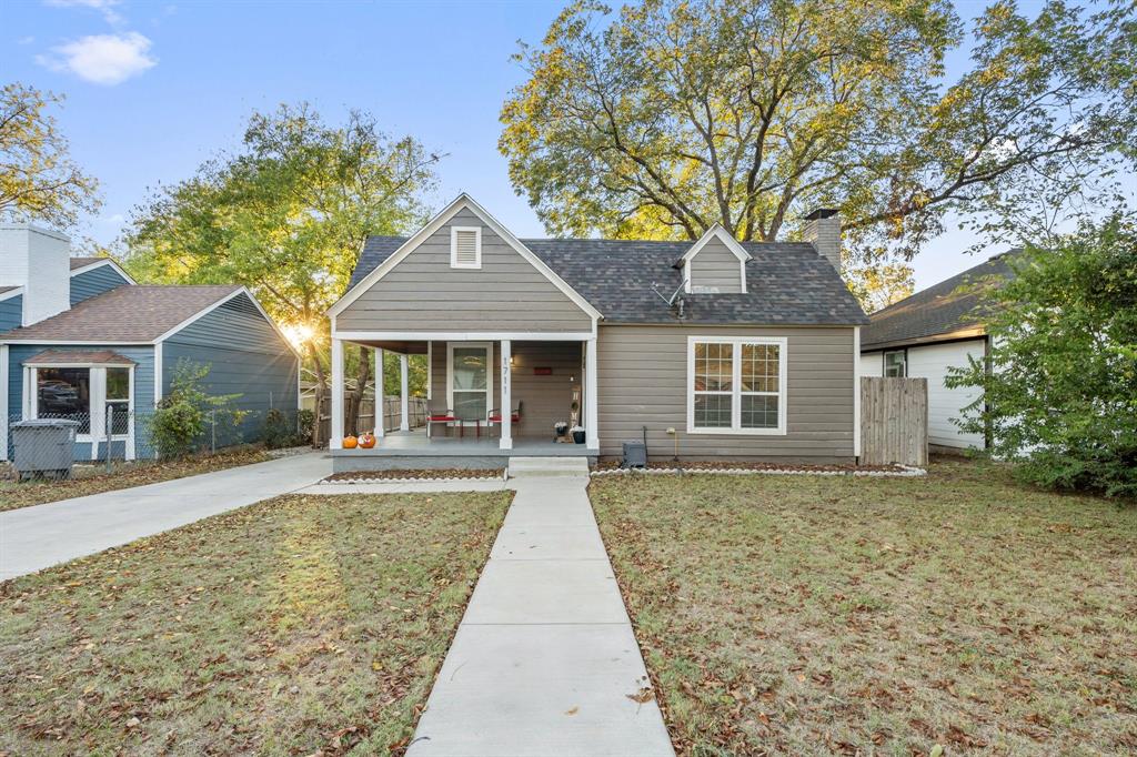 front view of a house with a yard