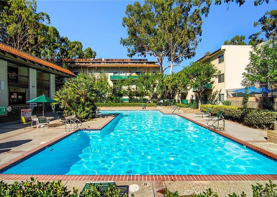 swimming pool with outdoor seating