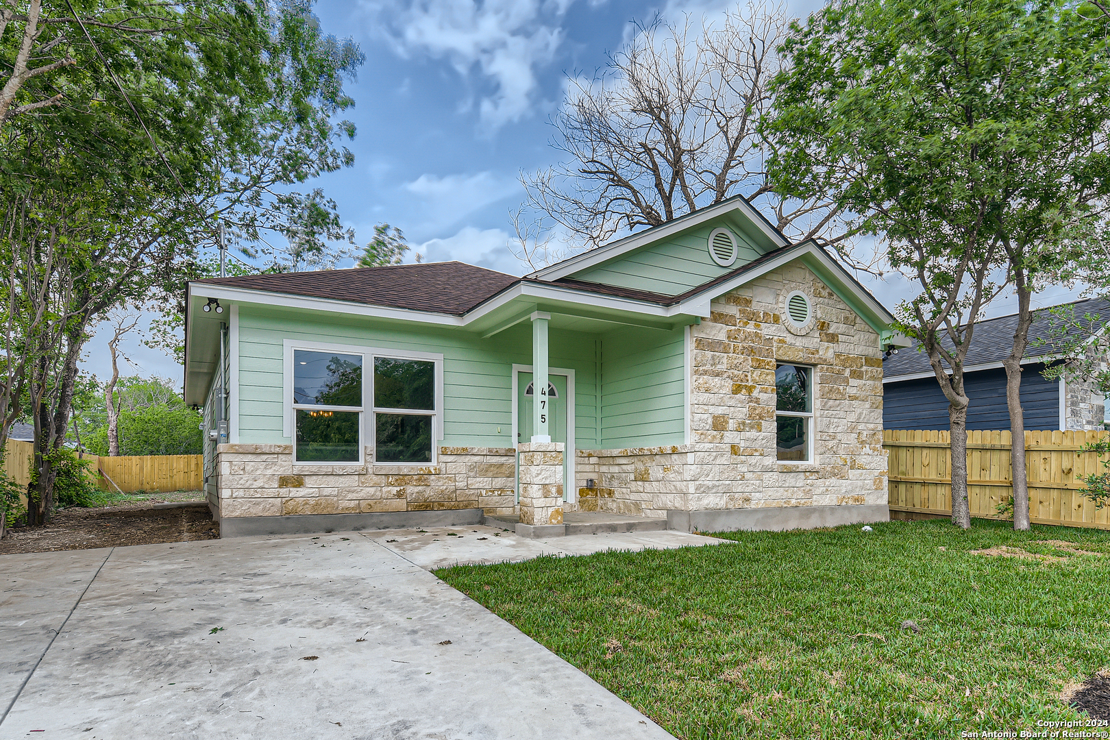 a front view of house with yard