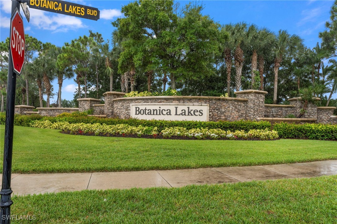 a view of a park that has a sign board