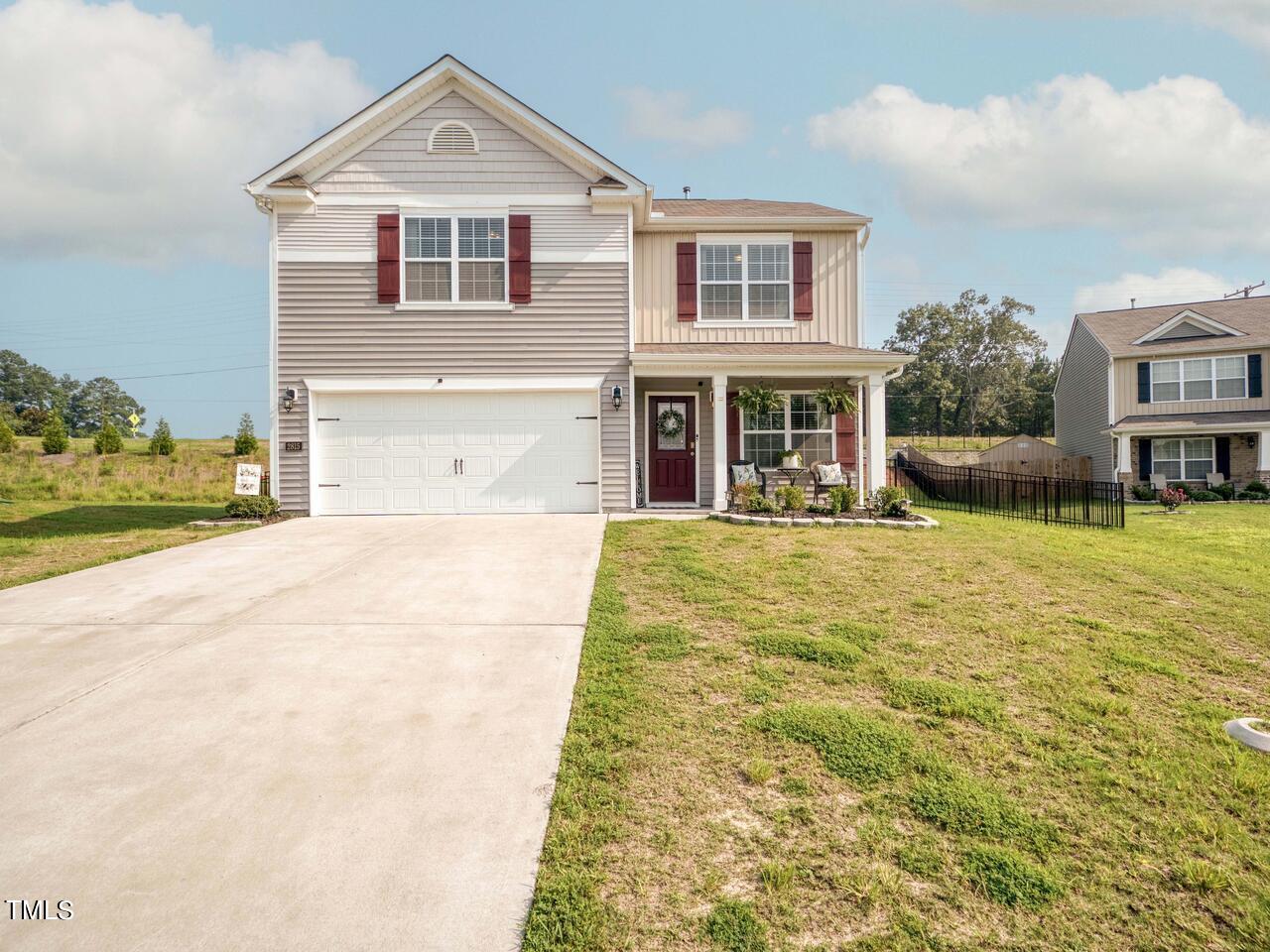 a front view of house with yard