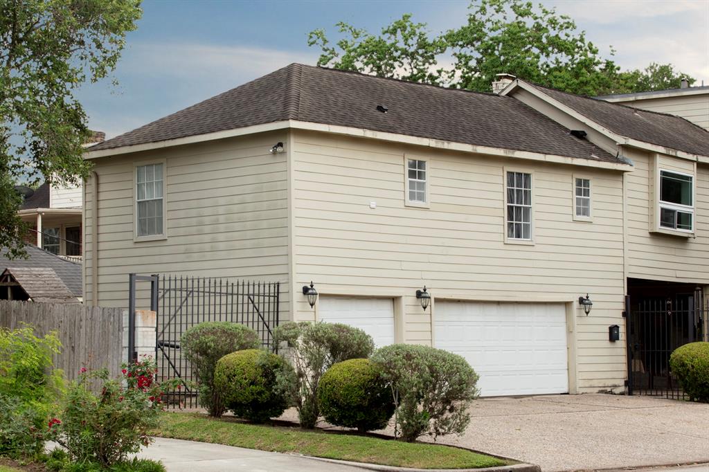 a view of a house with a garage