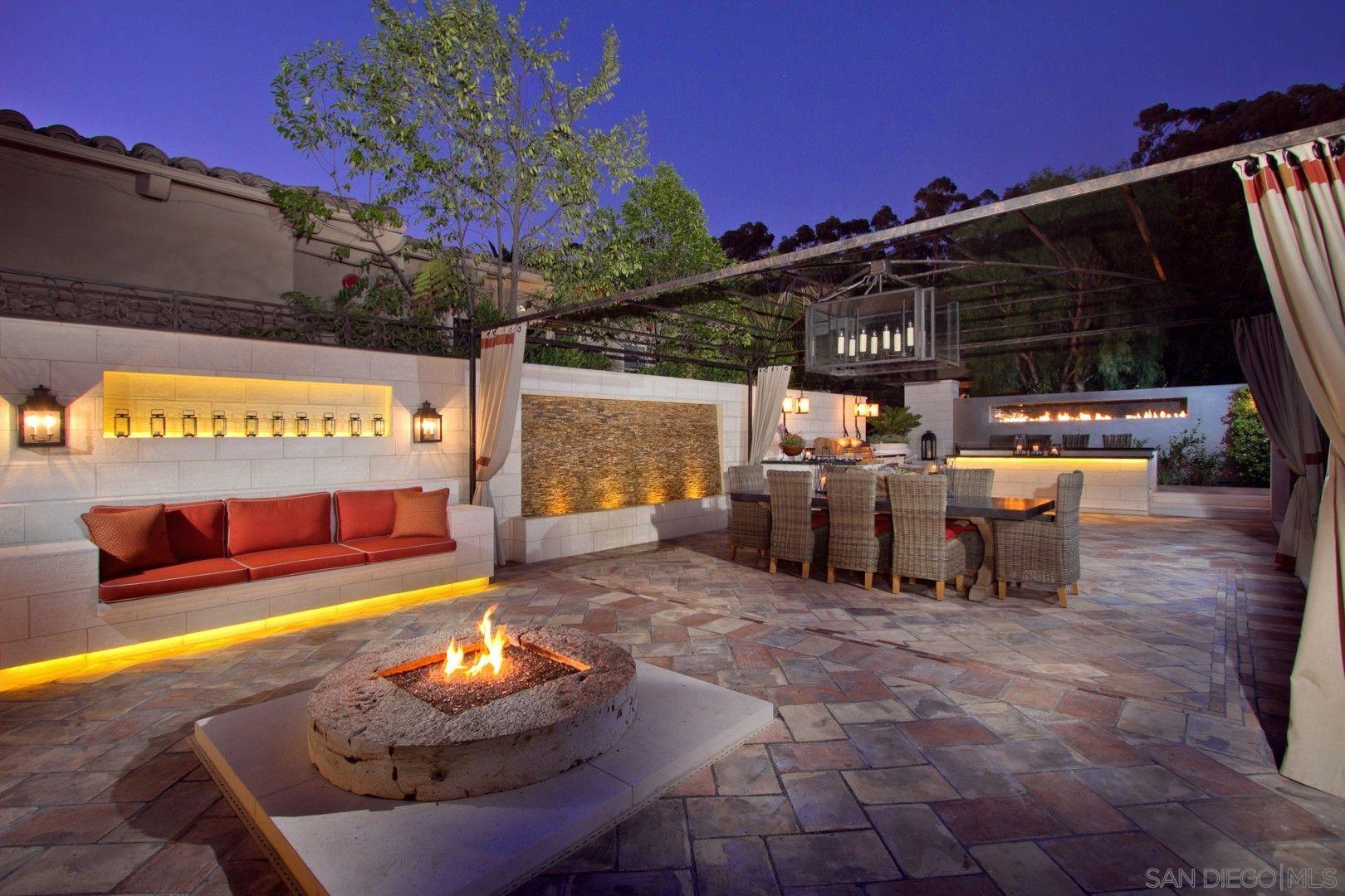 a view of a chairs and tables in the patio