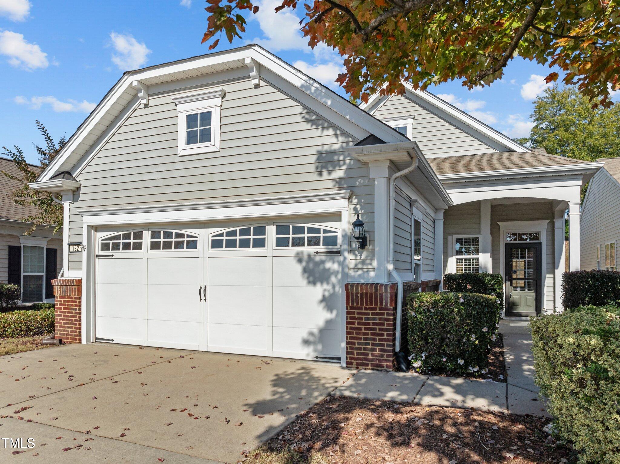 a view of a house with a garage