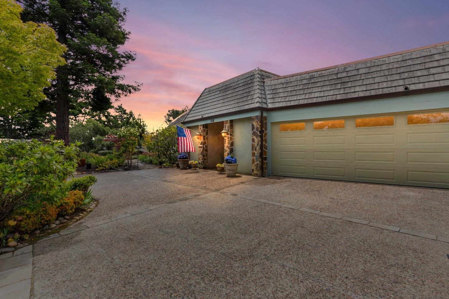 a view of a house with a garage